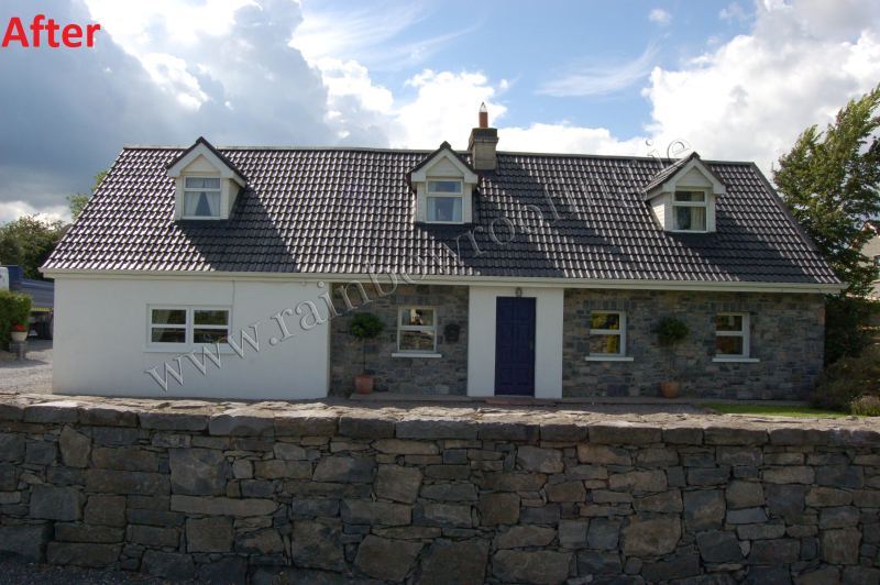 Small bungalow house with roof tiles painted in blue roof paint